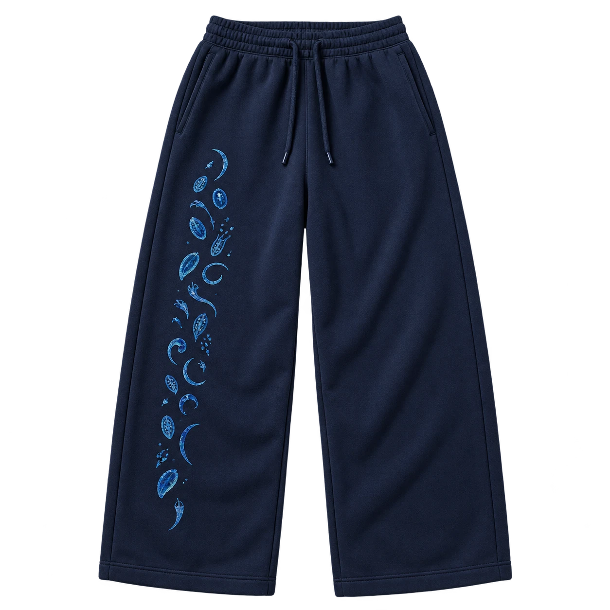 Front flat lay of midnight navy Fruit Cipher pants with abstract blue seed cells down the left leg.